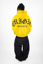 Load image into Gallery viewer, OE Rainbow Bustdown Arch on yellow Hoodie
